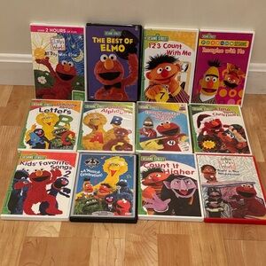 12 Sesame Street educational DVDs – count, ABC, Elmo, favorite songs